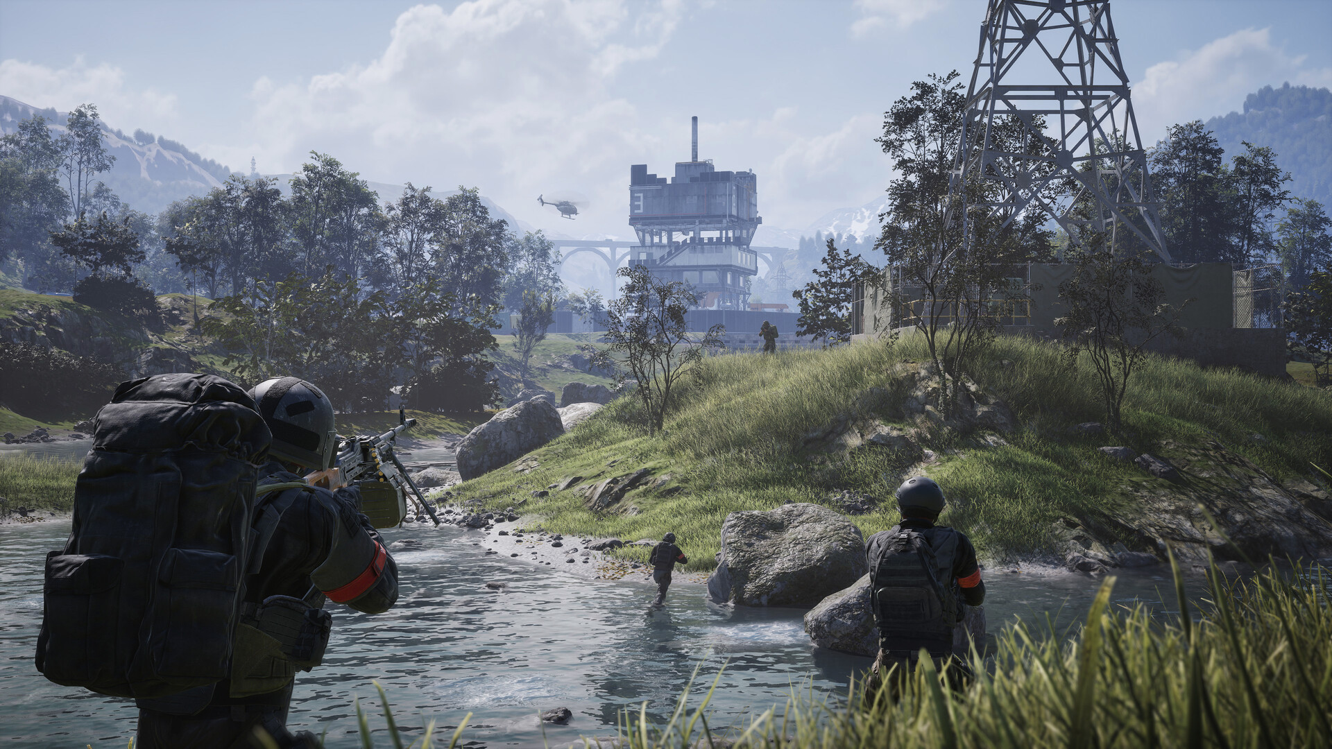 WARDOGS infantry crossing a river toward an industrial complex, with a helicopter overhead.